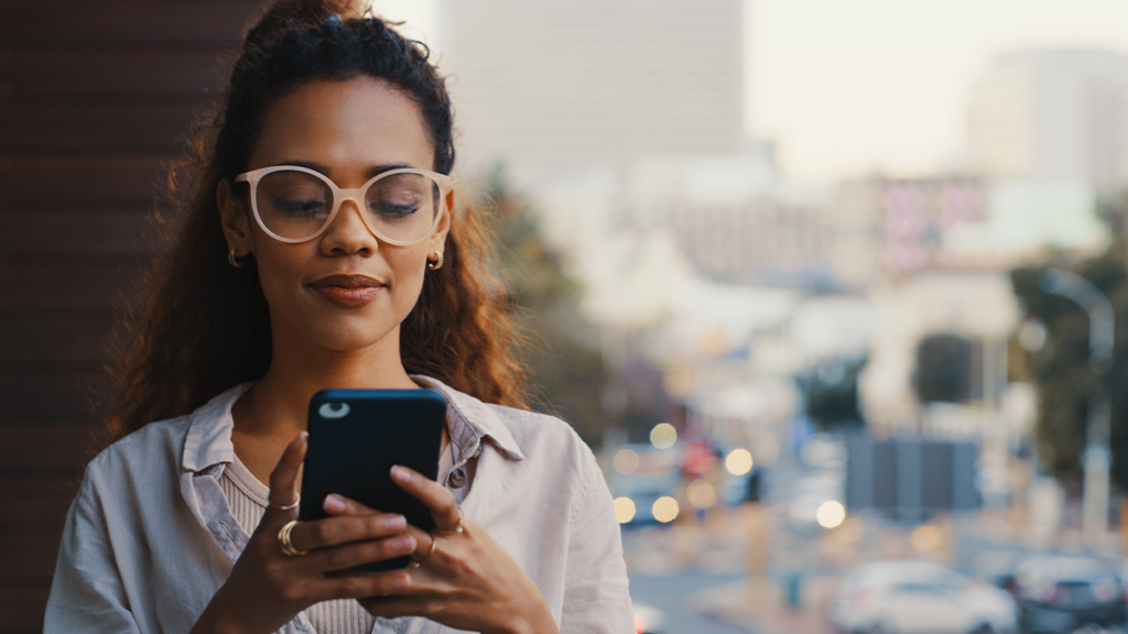 Young woman checks her tracked clinical data in her own mobile phone